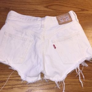 White distressed Levi denim shorts